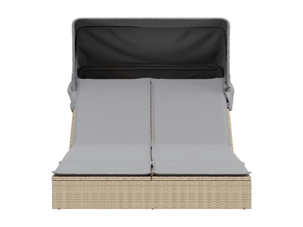 Fauteuil beige en rotin, avec coussins